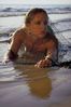 Woman on beach under net.jpg
