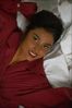 Woman on bed in robe.jpg