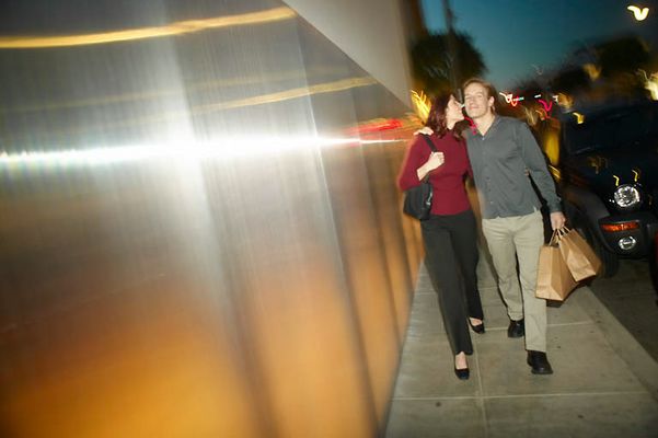 Adult couple walking together with shopping bags uid 1437919.jpg