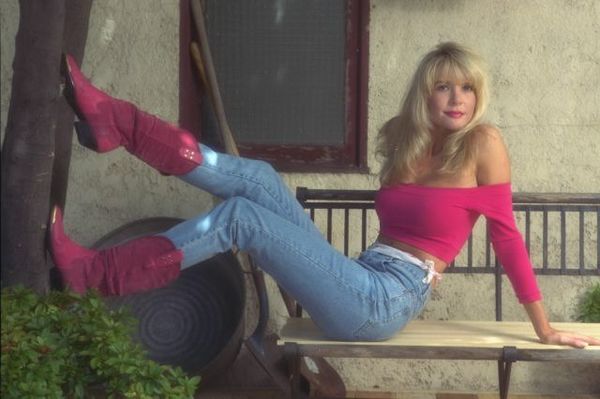 Blonde model with jeans and red cowboy boots an 2.jpg