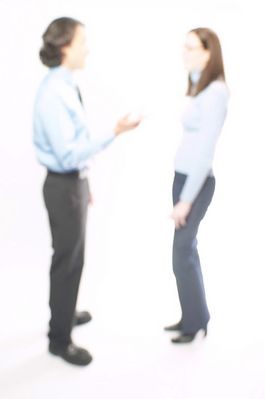 Blurred man and woman talking.jpg