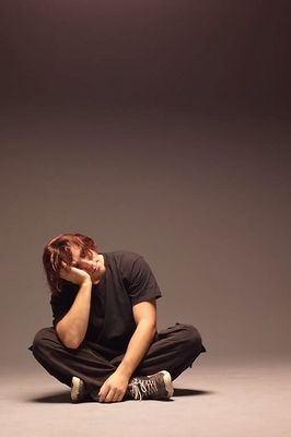 Bored man sitting cross legged.jpg
