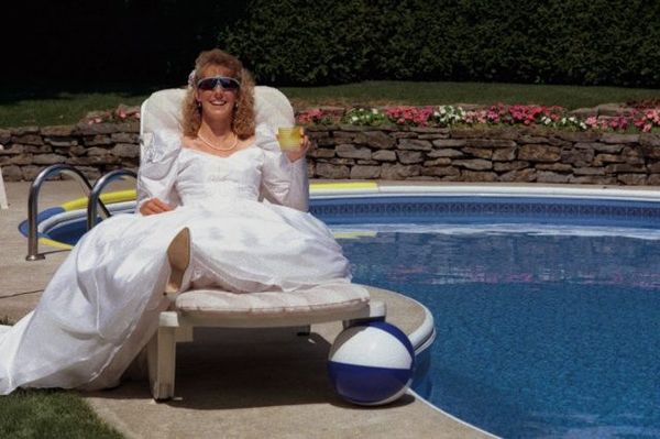 Bride lounging by pool.jpg