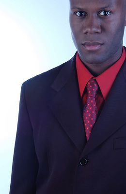 Businessman in red shirt and tie 1.jpg