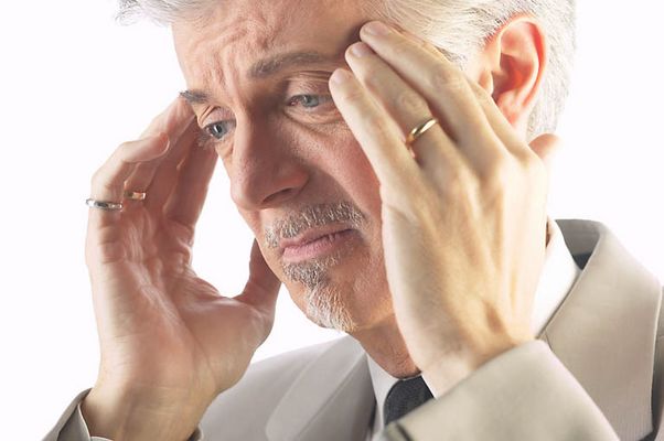 Businessman with a headache 1.jpg