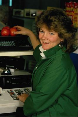 Cashier weighing apples.jpg