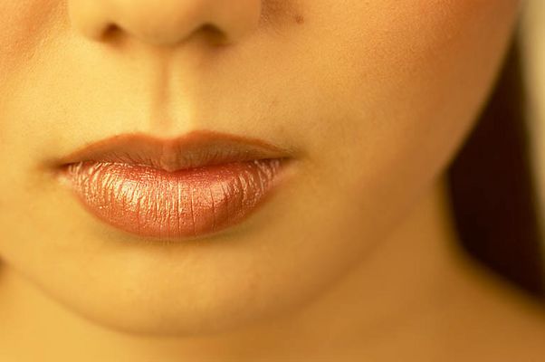 Close up of woman lips uid 1344512.jpg