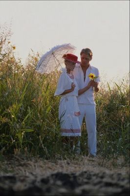 Couple standing near tall grass.jpg