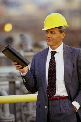 Man in suit with hard hat.jpg