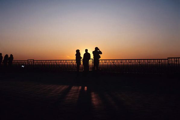 People at a lookout during sunset Montreal.jpg