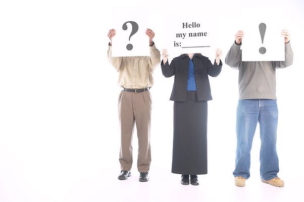 People holding up white sign.jpg