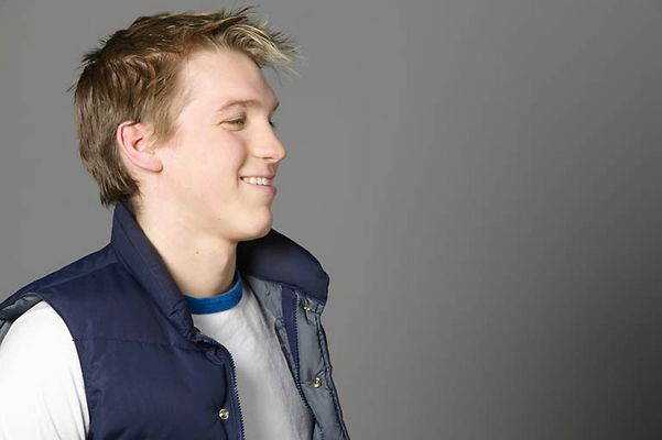 Profile of laughing male.jpg