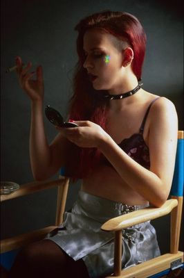 Red haired woman in dog collar.jpg