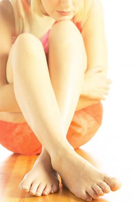 Seated barefoot woman.jpg