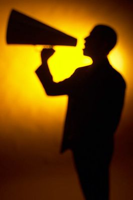 Silhouette of man yelling into a bullhorn 4.jpg