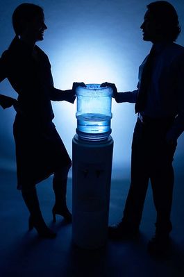 Silhouette of people talking at water cooler 4.jpg