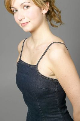 Smiling blonde wearing denim dress uid 1452848.jpg