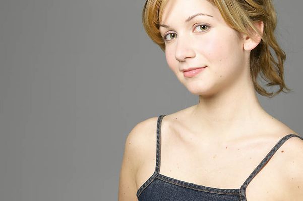 Smiling blonde wearing denim dress uid 1453403.jpg