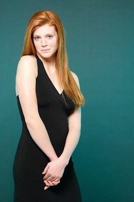 Smiling young red head uid 1453878.jpg