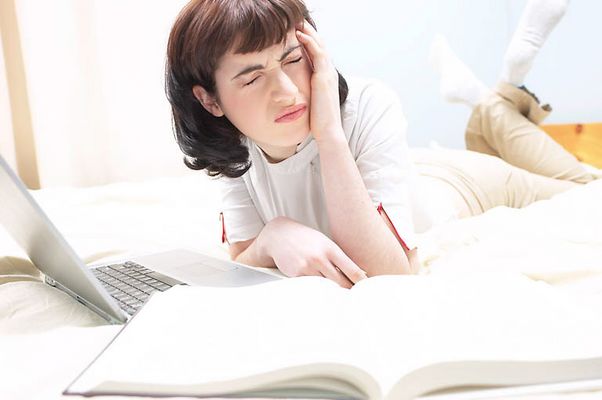 Student with headache uid 1427227.jpg