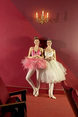 Two ballerinas in empty theater.jpg