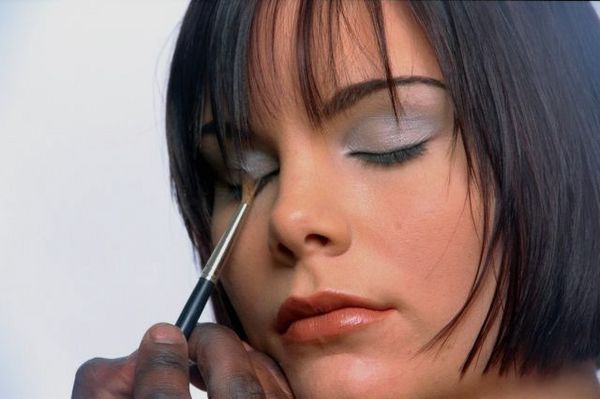 Woman having eyeshadow applied.jpg