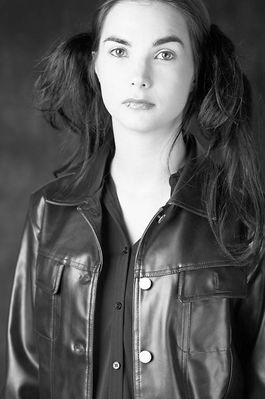 Woman in black leather jacket 2.jpg