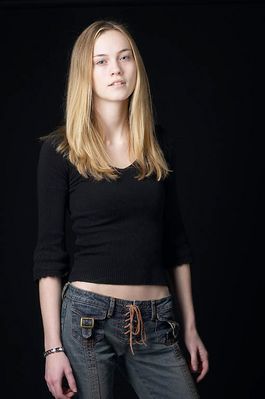 Woman in front of black background uid 1426760.jpg