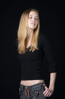 Woman in front of black background uid 1426767.jpg