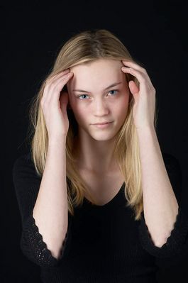 Woman in front of black background uid 1426774.jpg
