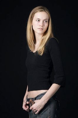 Woman in front of black background uid 1426786.jpg