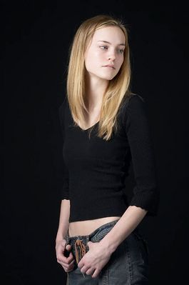 Woman in front of black background uid 1426787.jpg