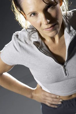 Woman in gray T shirt uid 1283805.jpg