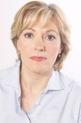 Woman in light blue shirt.jpg
