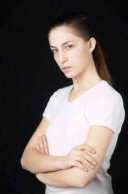 Woman in white t shirt uid 1426807.jpg