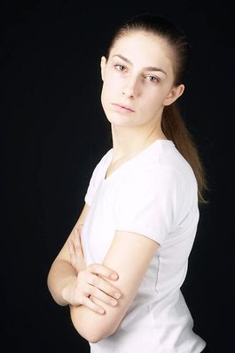 Woman in white t shirt uid 1426809.jpg