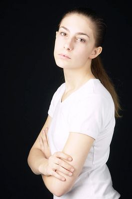 Woman in white t shirt uid 1426810.jpg