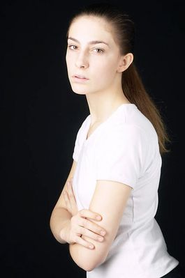 Woman in white t shirt uid 1426811.jpg