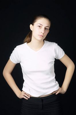 Woman in white t shirt uid 1426814.jpg