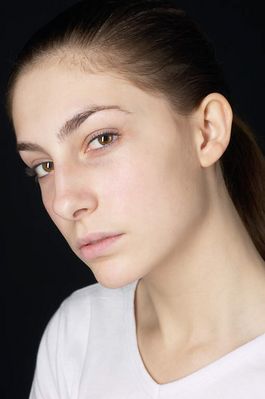 Woman in white t shirt uid 1426815.jpg