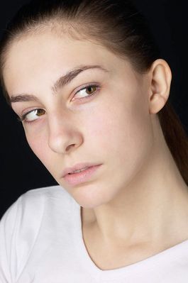 Woman in white t shirt uid 1426816.jpg
