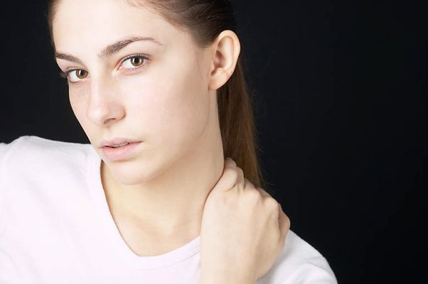 Woman in white t shirt uid 1426819.jpg