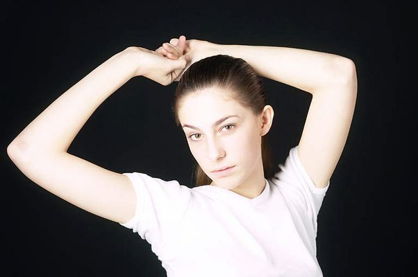 Woman in white t shirt uid 1426821.jpg