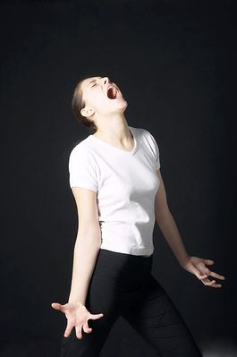 Woman in white t shirt uid 1426834.jpg