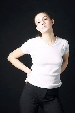 Woman in white t shirt uid 1426837.jpg