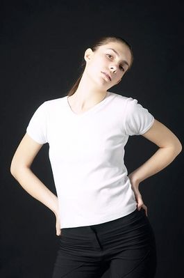 Woman in white t shirt uid 1426838.jpg