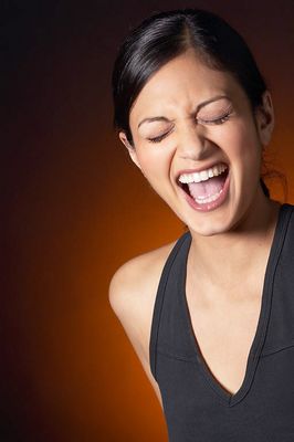 Woman laughing uid 1426327.jpg