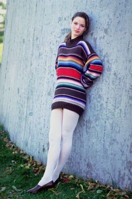 Woman leaning in striped sweater.jpg
