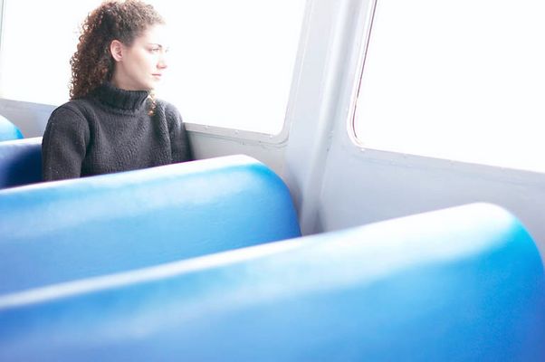 Woman looking out bus window.jpg