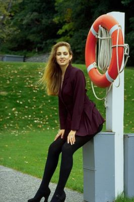 Woman sitting by red buoy.jpg